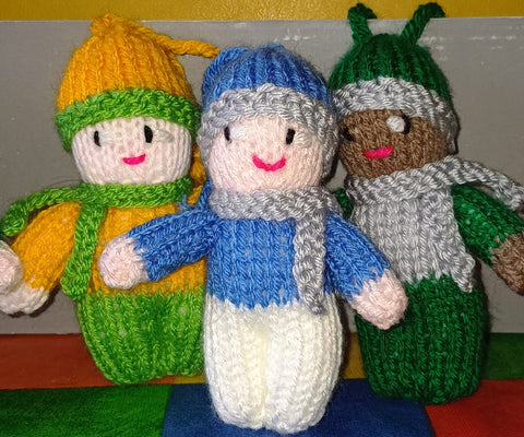 A group of 3 knitted hanging mascots.